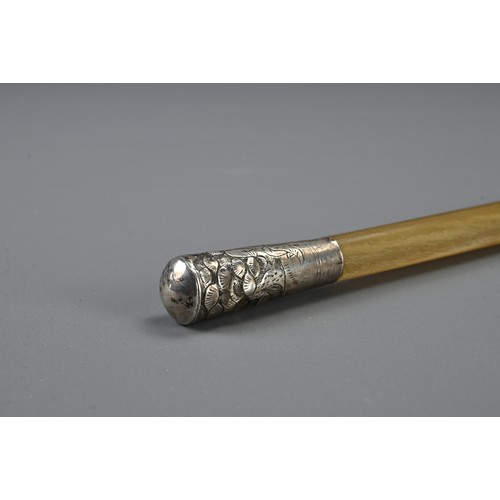 343 - A LATE 19TH CENTURY ASIAN HORN AND WHITE-METAL TOPPED SWAGGER STICK/CANE. The tapering cane with sil... 