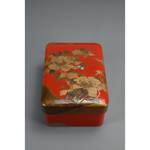 311 - A JAPANESE MEIJI/TAISHO VERMILLION LACQUER DOCUMENT BOX (BUNKO), EARLY 20TH CENTURY. With superb peo... 