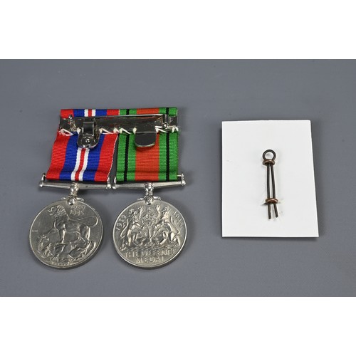 342 - TWO GEORGE VI II WORLD WAR MEDALS, A MIDDLESEX REGIMENT CAP AND BADGE AND A COLLAR BADGE, TOGETHER W... 