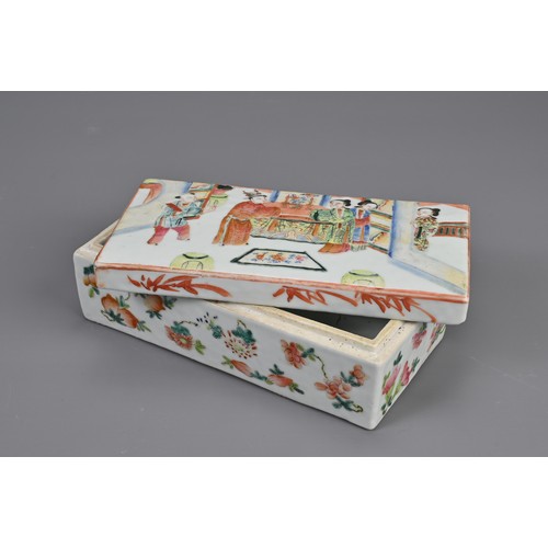 154 - A CHINESE FAMILLE ROSE PEN BOX AND COVER, 19TH CENTURY. Of rectangular form with two compartments to... 