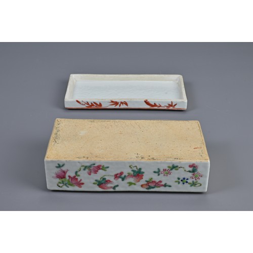 154 - A CHINESE FAMILLE ROSE PEN BOX AND COVER, 19TH CENTURY. Of rectangular form with two compartments to... 