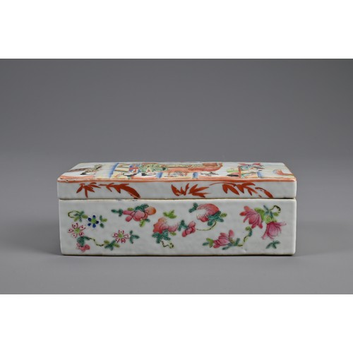 154 - A CHINESE FAMILLE ROSE PEN BOX AND COVER, 19TH CENTURY. Of rectangular form with two compartments to... 