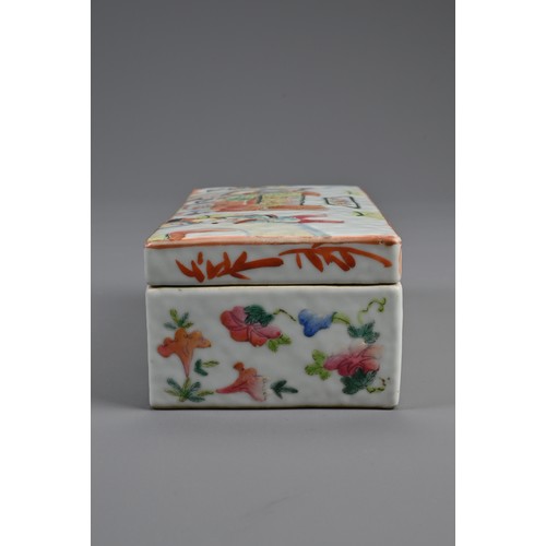 154 - A CHINESE FAMILLE ROSE PEN BOX AND COVER, 19TH CENTURY. Of rectangular form with two compartments to... 