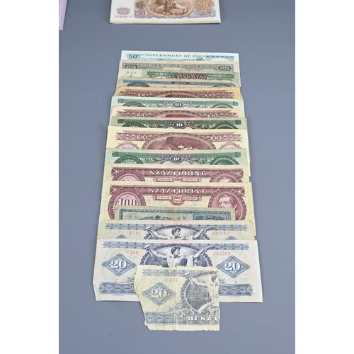 339 - COLLECTION OF WORLDWIDE BANKNOTES. Comprising: Hungarian (20, 100 Forint) Bulgarian (50 Leva, 1951),... 