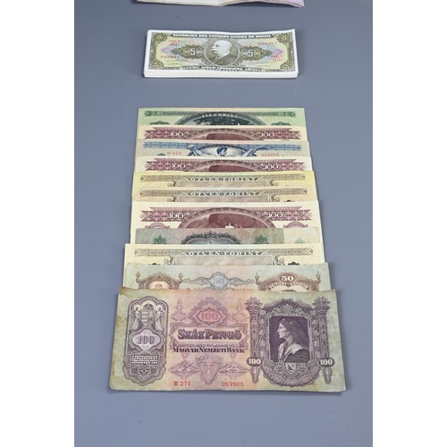 339 - COLLECTION OF WORLDWIDE BANKNOTES. Comprising: Hungarian (20, 100 Forint) Bulgarian (50 Leva, 1951),... 