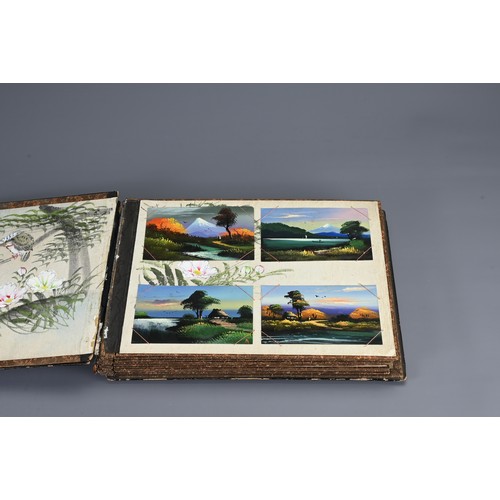 258 - TWO JAPANESE BLACK LACQUERED PHOTO ALBUMS, EARLY 20TH CENTURY. Each album with nine pages holding po... 