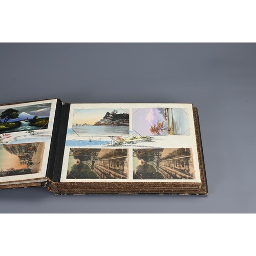 258 - TWO JAPANESE BLACK LACQUERED PHOTO ALBUMS, EARLY 20TH CENTURY. Each album with nine pages holding po... 