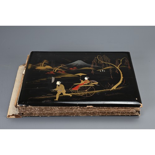 258 - TWO JAPANESE BLACK LACQUERED PHOTO ALBUMS, EARLY 20TH CENTURY. Each album with nine pages holding po... 