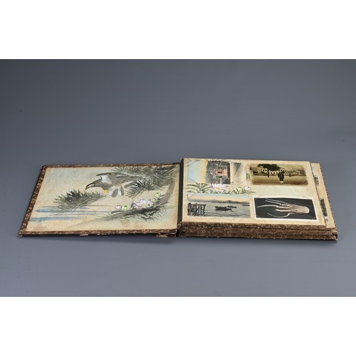 258 - TWO JAPANESE BLACK LACQUERED PHOTO ALBUMS, EARLY 20TH CENTURY. Each album with nine pages holding po... 