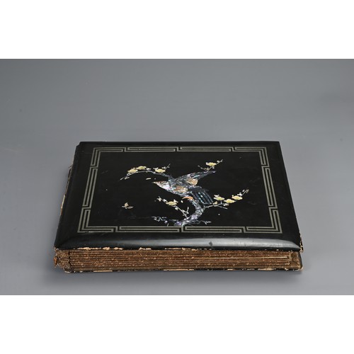 258 - TWO JAPANESE BLACK LACQUERED PHOTO ALBUMS, EARLY 20TH CENTURY. Each album with nine pages holding po... 