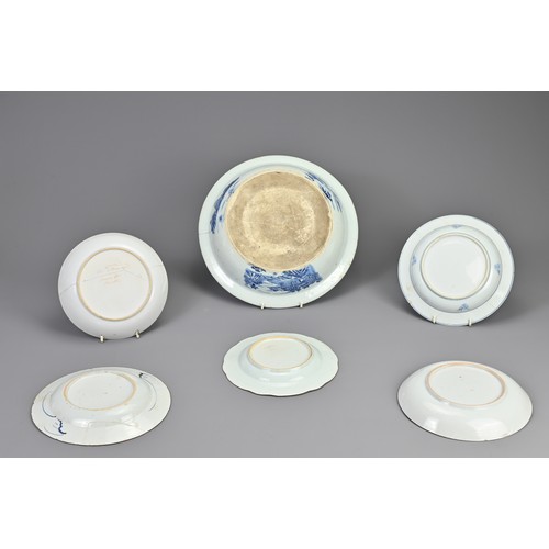 22 - A GROUP OF CHINESE BLUE AND WHITE PORCELAIN DISHES, 18TH CENTURY. To include a large deep dish decor... 