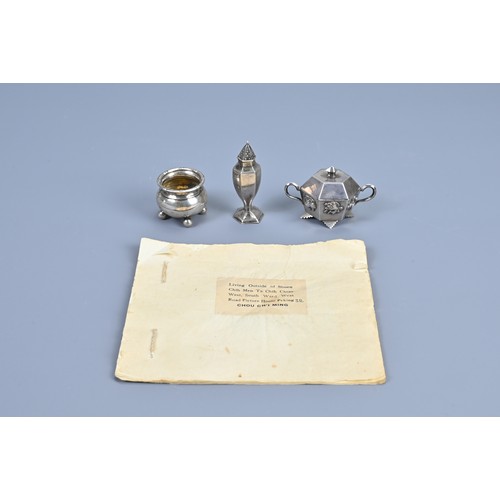 118 - THREE CHINESE SILVER CRUET ITEMS AND PAINTED BOOKLET, EARLY 20TH CENTURY. To include salt pots and s... 