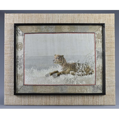 224 - TWO CHINESE FRAMED EMBROIDERIES, 20TH CENTURY. To include a silk embroidered scene with a tiger in m... 