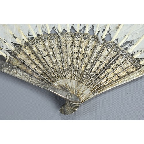 63 - A RARE CHINESE SILVER FILIGREE PAINTED FEATHER FAN, CIRCA 1900. Probably Canton. The feathers painte... 