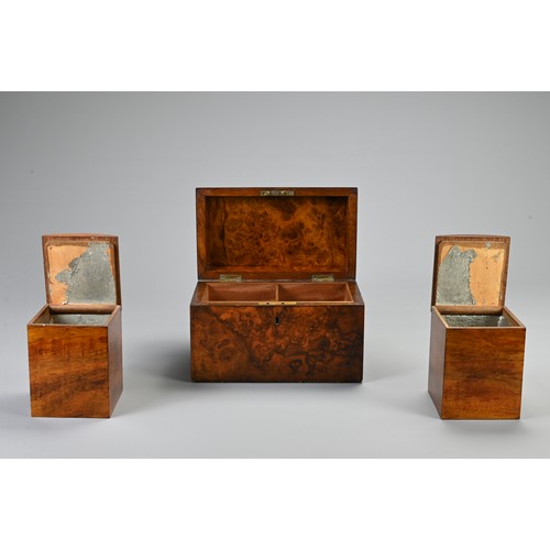 355 - AN EDWARDIAN WALNUT STATIONARY BOX AND A 19TH CENTURY DOMED RECTANGULAR TEA CADDY. The hinged statio... 