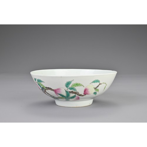 107 - A CHINESE FAMILLE ROSE PORCELAIN BOWL, 19/20TH CENTURY. Rounded bowl decorated with nine peaches on ... 