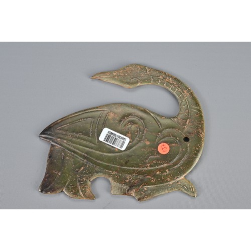 111 - A LARGE CHINESE NEPHRITE JADE PENDANT IN THE FORM OF A PHOENIX. Recumbent figure with its head turne... 