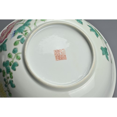 161 - A CHINESE FAMILLE ROSE PORCELAIN BOWL, 20TH CENTURY. A wide rounded bowl with gently everted rim dec... 