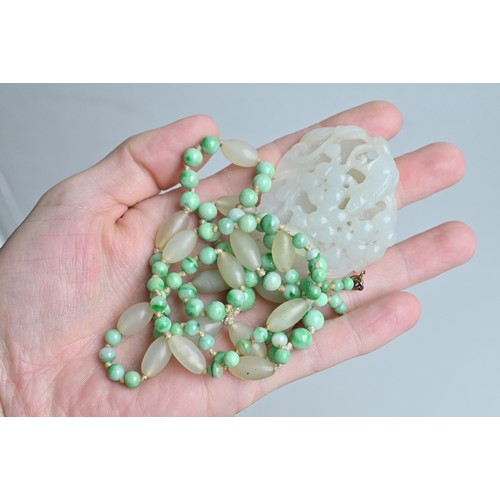 113 - A JADE JADEITE BEADED NECKLACE WITH PENDANTS, 19/20TH CENTURY. Comprising a carved and pierced jadei... 