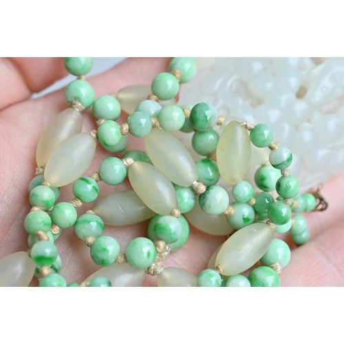 113 - A JADE JADEITE BEADED NECKLACE WITH PENDANTS, 19/20TH CENTURY. Comprising a carved and pierced jadei... 