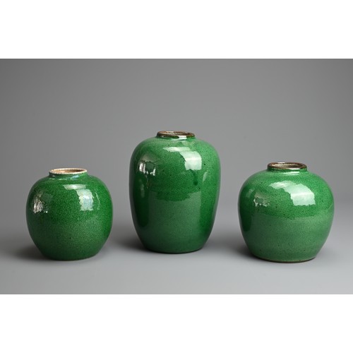 2 - THREE CHINESE GREEN CRACKLE GLAZED PORCELAIN JARS, LATE QING / REPUBLIC PERIOD. Of graduating sizes ... 