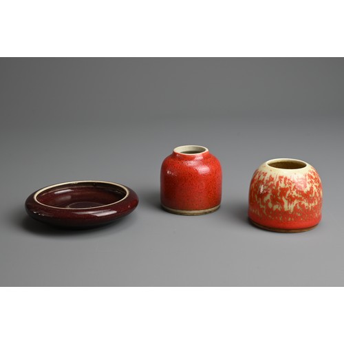 7 - A CHINESE FLAMBE TYPE PORCELAIN BRUSH WASHER AND TWO WATER POTS, QING DYNASTY AND LATER. The brush w... 