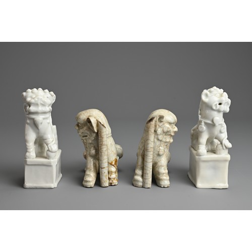 8 - TWO PAIRS OF CHINESE PORCELAIN JOSS STICK HOLDERS, QING DYNASTY. In the form of lion dogs, seated wi... 