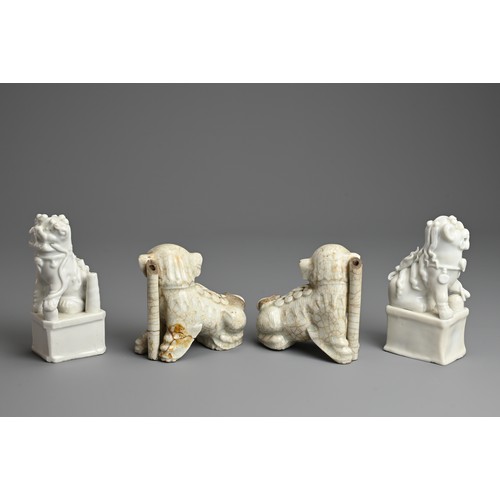 8 - TWO PAIRS OF CHINESE PORCELAIN JOSS STICK HOLDERS, QING DYNASTY. In the form of lion dogs, seated wi... 