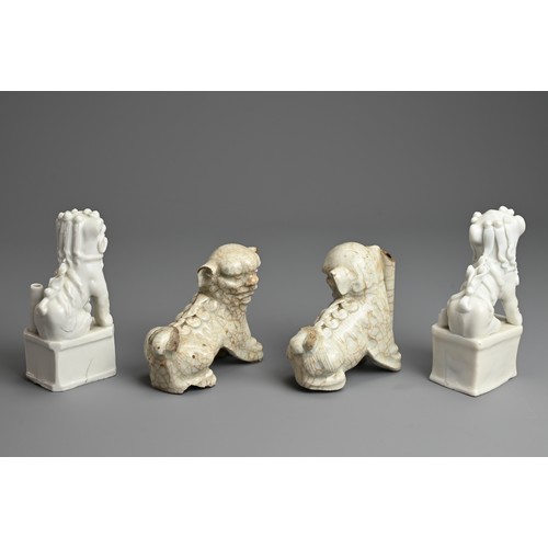 8 - TWO PAIRS OF CHINESE PORCELAIN JOSS STICK HOLDERS, QING DYNASTY. In the form of lion dogs, seated wi... 