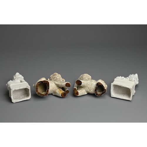 8 - TWO PAIRS OF CHINESE PORCELAIN JOSS STICK HOLDERS, QING DYNASTY. In the form of lion dogs, seated wi... 