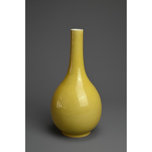 14 - A FINE CHINESE YELLOW GLAZED PORCELAIN BOTTLE VASE, REPUBLIC PERIOD. Of pear shape with cylindrical ... 