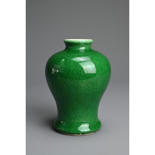 17 - A CHINESE GREEN GLAZED PORCELAIN VASE, 18TH CENTURY. Heavily potted of baluster form covered in a ri... 