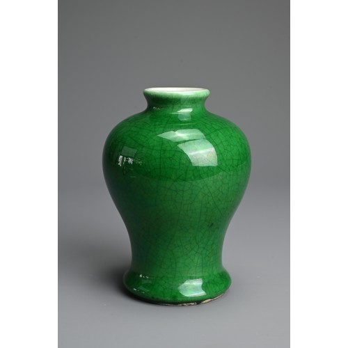 17 - A CHINESE GREEN GLAZED PORCELAIN VASE, 18TH CENTURY. Heavily potted of baluster form covered in a ri... 