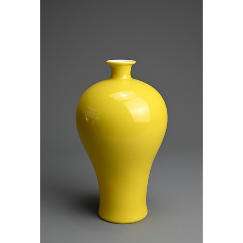 329 - A CHINESE YELLOW GLAZED PORCELAIN MEIPING VASE, 20TH CENTURY. Covered in a bright even yellow glaze ... 