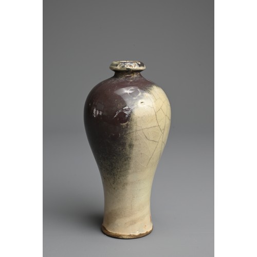 19 - A CHINESE FLAMBE TYPE PORCELAIN MEIPING VASE, QING DYNASTY. Decorated in a deep purplish glaze cover... 