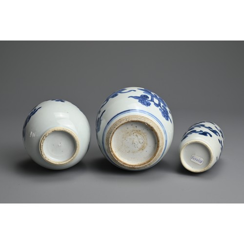 24 - THREE CHINESE BLUE AND WHITE PORCELAIN ITEMS, 18TH CENTURY. Of varying forms decorated in a rich und... 