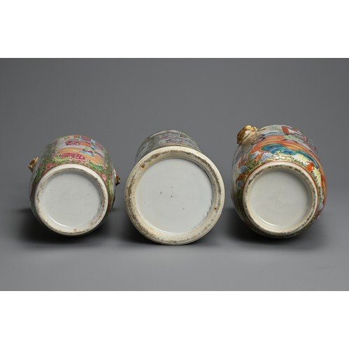 29 - THREE CHINESE CANTON FAMILLE ROSE PORCELAIN VASES, 19/20TH CENTURY. To include two baluster form vas... 