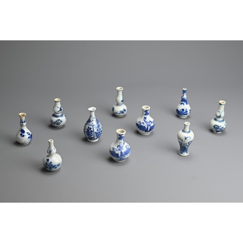 79 - A GROUP OF CHINESE BLUE AND WHITE PORCELAIN DOLL'S HOUSE MINIATURE VASES, EARLY 18TH CENTURY. Ten va... 