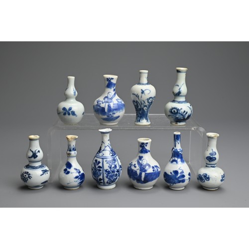 79 - A GROUP OF CHINESE BLUE AND WHITE PORCELAIN DOLL'S HOUSE MINIATURE VASES, EARLY 18TH CENTURY. Ten va... 