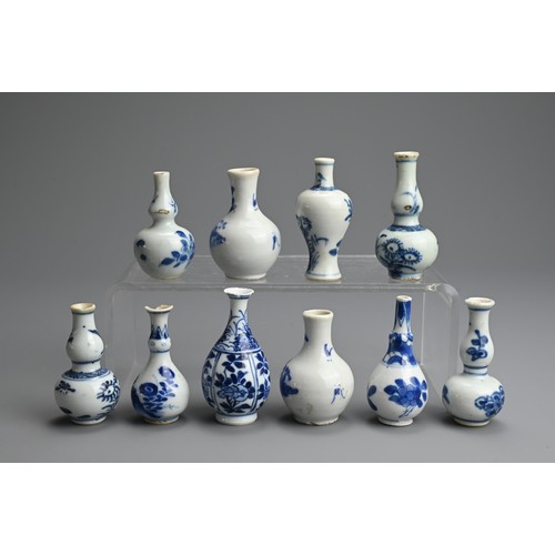 79 - A GROUP OF CHINESE BLUE AND WHITE PORCELAIN DOLL'S HOUSE MINIATURE VASES, EARLY 18TH CENTURY. Ten va... 