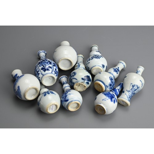 79 - A GROUP OF CHINESE BLUE AND WHITE PORCELAIN DOLL'S HOUSE MINIATURE VASES, EARLY 18TH CENTURY. Ten va... 