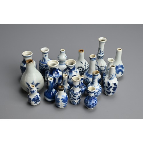 80 - A GROUP OF CHINESE BLUE AND WHITE DOLL'S HOUSE MINIATURE PORCELAIN VASES, 18TH CENTURY. Twenty vases... 