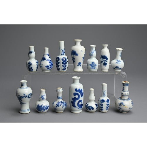 81 - A GROUP OF CHINESE BLUE AND WHITE DOLL'S HOUSE MINIATURE PORCELAIN VASES, EARLY 18TH CENTURY. Fourte... 