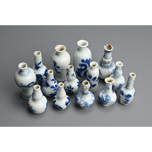 81 - A GROUP OF CHINESE BLUE AND WHITE DOLL'S HOUSE MINIATURE PORCELAIN VASES, EARLY 18TH CENTURY. Fourte... 