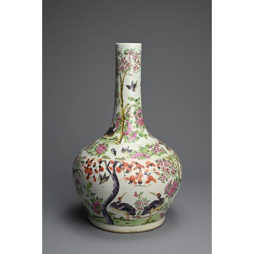 37 - A CHINESE FAMILLE ROSE PORCELAIN BOTTLE VASE, 19TH CENTURY. A globular body with cylindrical neck de... 