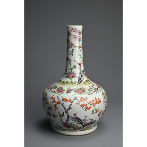 38 - A CHINESE FAMILLE ROSE PORCELAIN BOTTLE VASE, 19TH CENTURY. A globular body with cylindrical neck de... 