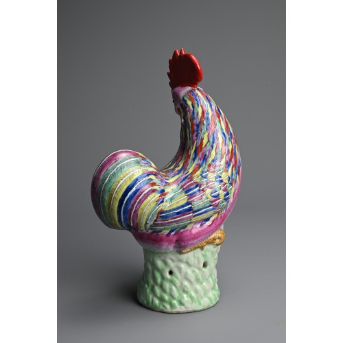 42 - A CHINESE POLYCHROME DECORATED PORCELAIN MODEL OF A ROOSTER, 18TH CENTURY. Standing on a pierced bas... 