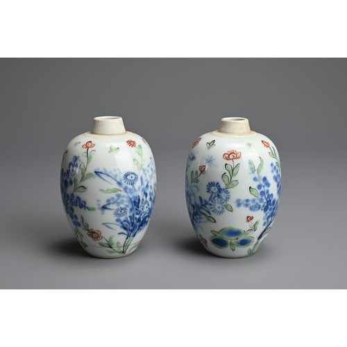 43 - A PAIR OF CHINESE WUCAI PORCELAIN OVIFORM JARS, EARLY 18TH CENTURY. Decorated with flowering branche... 