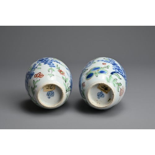 43 - A PAIR OF CHINESE WUCAI PORCELAIN OVIFORM JARS, EARLY 18TH CENTURY. Decorated with flowering branche... 