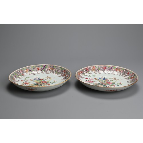 47 - A PAIR OF CHINESE FAMILLE ROSE PORCELAIN DISHES, 18TH CENTURY. Decorated with baskets of flowers wit... 